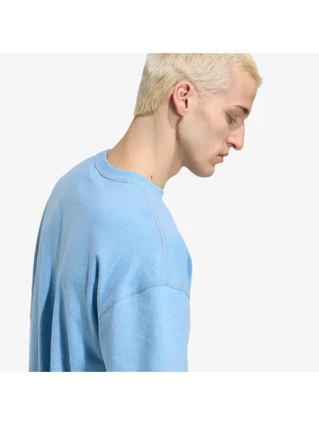 Orezané tričko Adidas Originals so slieňovým vzorom modrá