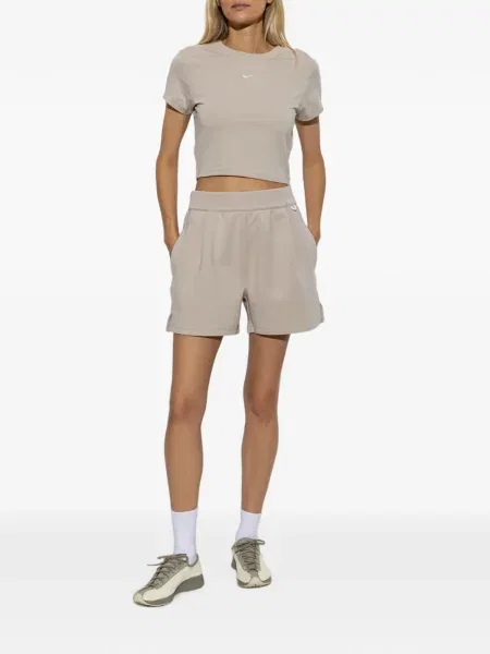 Decupat pantaloni scurți Nike cu broderie plasă roz