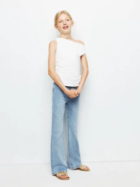 Jeansy flare bez paska w talii średni Dzieci 8 MANGO KIDS niebieski