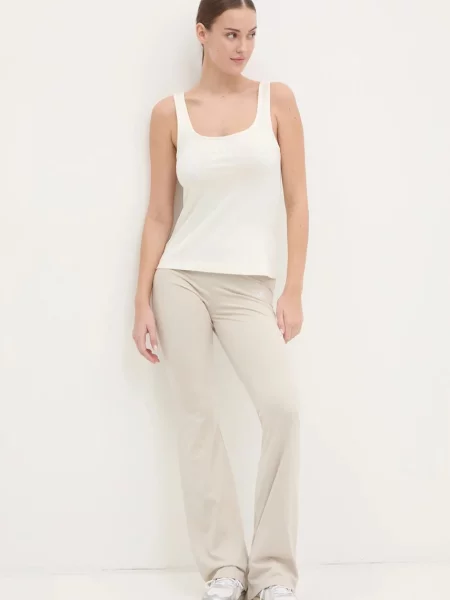 Adidas legginsy Essentials gładkie beżowy