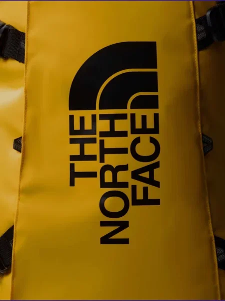 Чемодан The North Face желтый
