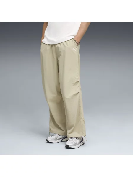 PUMA spodnie spadochroniarskie Wardrobe Essentials o kroju oversize Akcesoria S beżowy
