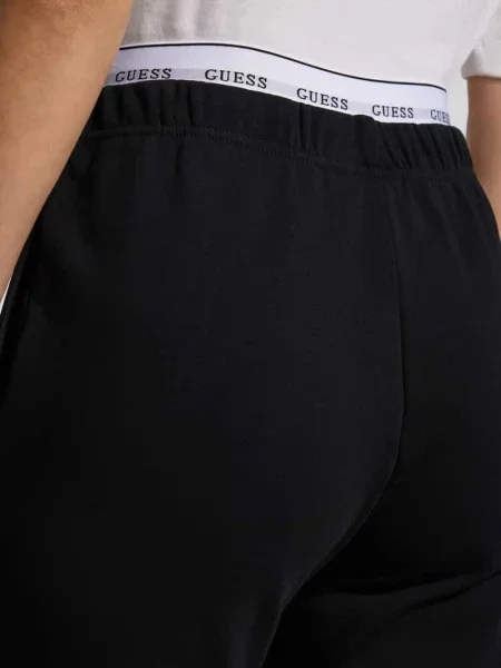 Spodnie dresowe o kroju regular fit z paskiem z logo model ‘SOFIA’ Guess czarne