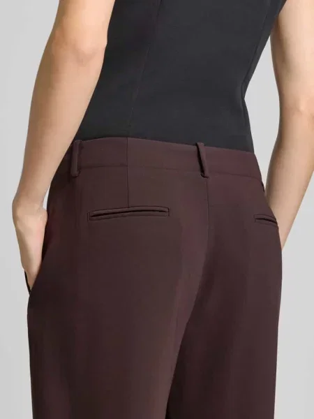 Spodnie materiałowe o kroju relaxed fit z zakładkami w pasie Armani Exchange