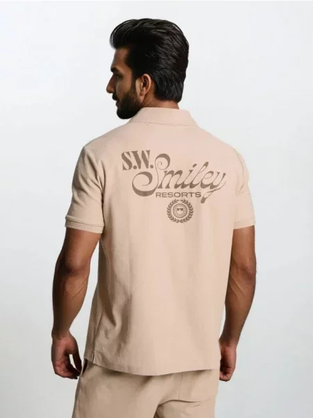 Sinsay polo z nadrukiem Smiley beżowy