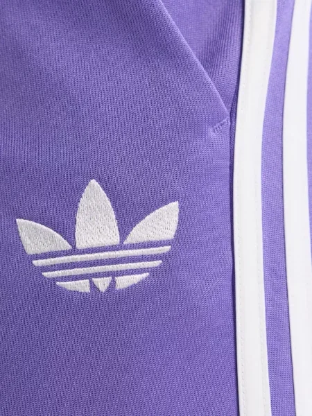 Pantaloni evazați Adidas evazat din jerseu cu cordon albastru