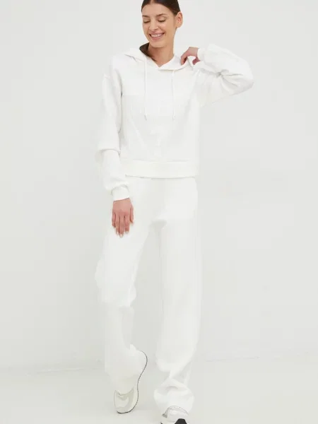 Guess spodnie dresowe BRENDA z nadrukiem beżowy