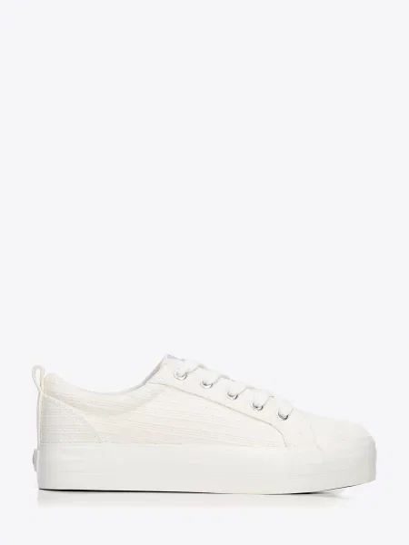 Sneakersy na platformie kremowe
