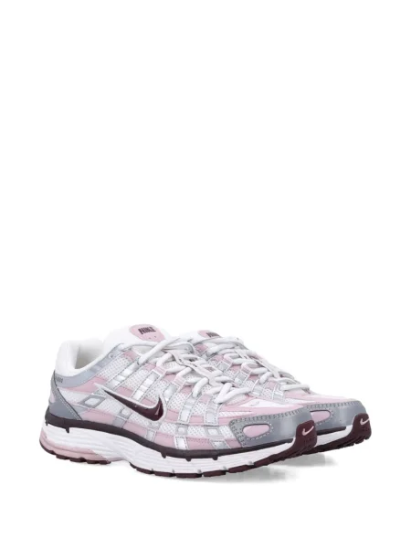 Iš natūralios odos retro stiliaus kelnės Nike apvaliu kaklu ruda