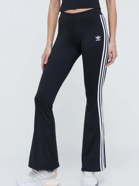 Спортен панталон adidas Originals Flared Leggings черно с апликация
