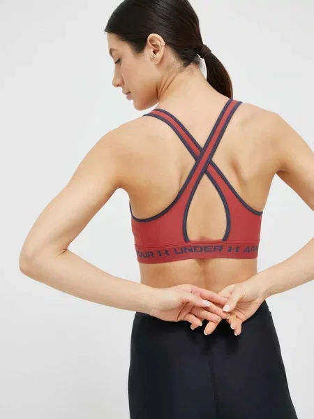 Under Armour sportovní podprsenka UA Crossback oranžová