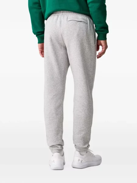 Trčanje hlače Under Armour s autogramom s vezicama siva
