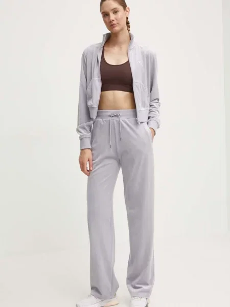 Спортивні штани Guess з аплікацією фіолетовий