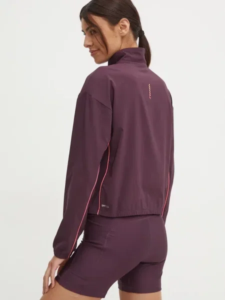 Női futódzseki PUMA Run For Her Fashion Woven ZIP éjféli szilva/ naplemente fénye. Méret: XS lila
