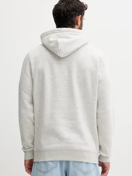 Tommy Jeans pulover s kapuco z bombažem siva