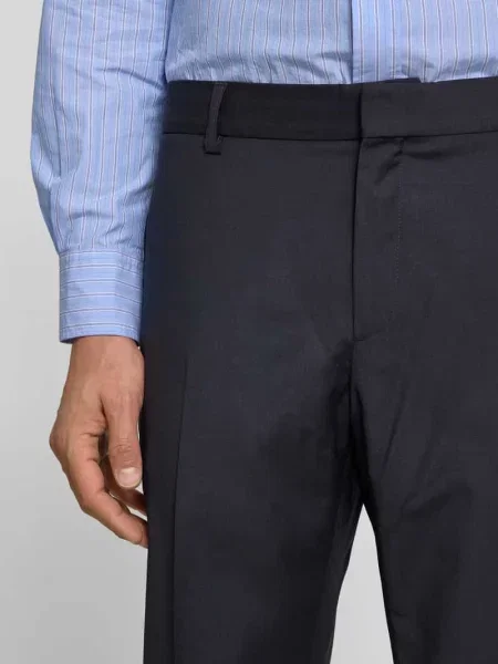 Spodnie garniturowe o kroju slim fit z mieszanki wełny Filippa K granatowe