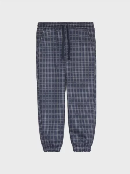 Sinsay Zateplené oversize kalhoty jogger s kostkovaným vzorem a fleecovou podšívkou námořnická modrá