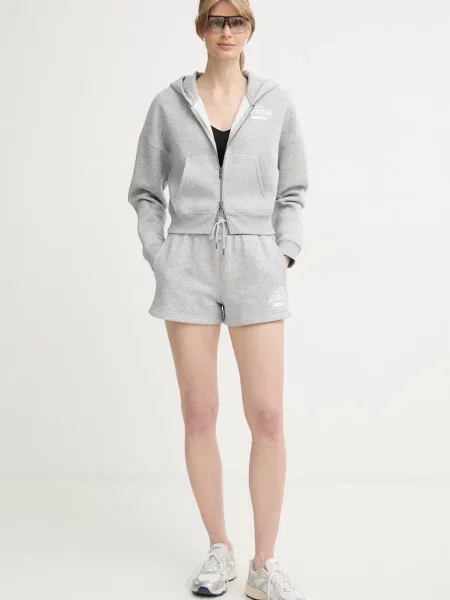 Under Armour jopica s kapuco z bombažem Icon siva