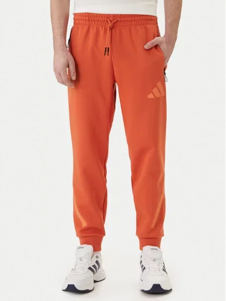 Adidas Долнище анцуг Z.N.E. оранжев