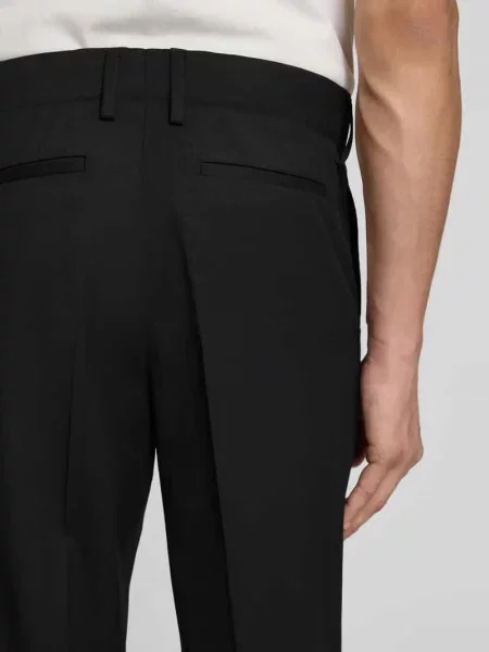Spodnie garniturowe o kroju slim fit z dodatkiem wełny Filippa K czarne