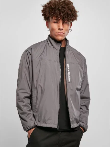 Reversibil geacă Urban Classics din fleece negru