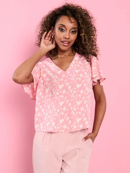 Блузка з квітковим принтом різнобарвний