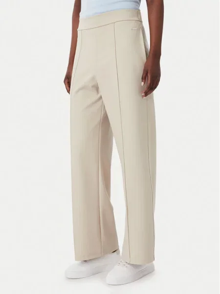 Kalhoty z materiálu Calvin Klein béžové