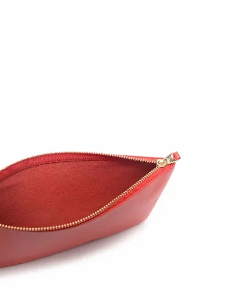 Kožená peněženka Comme Des Garçons Wallet s potiskem oranžová
