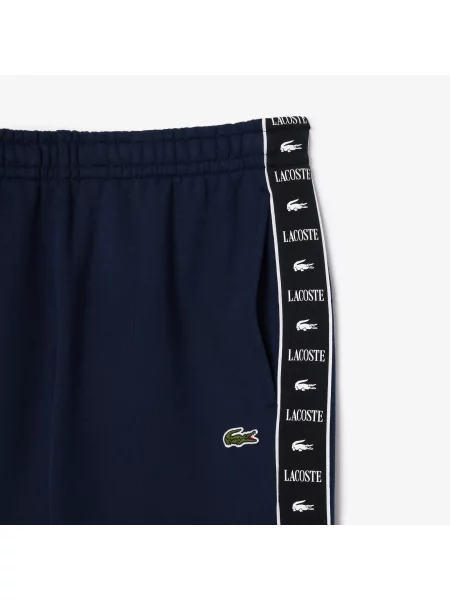 Lacoste Spodnie Dresowe O Zwężanym Kroju Z Nadrukiem granatowy