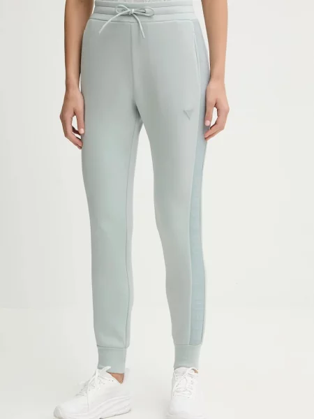 Спортивные штаны Guess с принтом фиолетовые