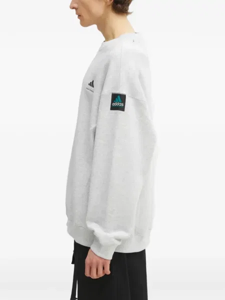 Sneakersy Adidas Predator w paski z dekoltem w serek z kapturem różowe