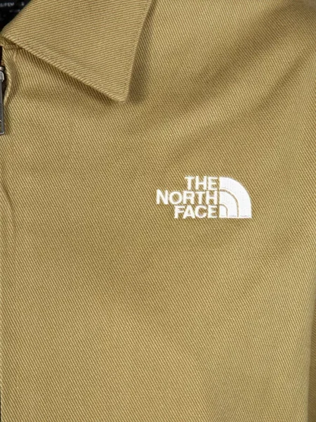 Geacă The North Face din țesătură twill maro