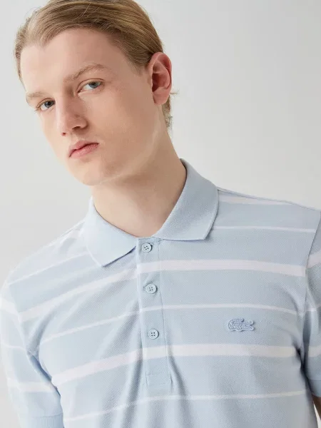 Поло Lacoste голубое