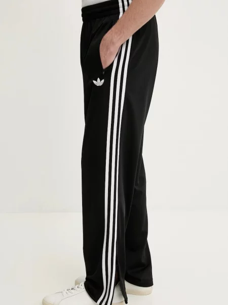 Спортивні штани adidas Originals Firebird з аплікацією чорний