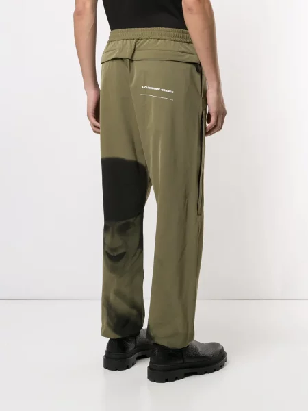 Pantaloni Undercover cu imagine alergare verde