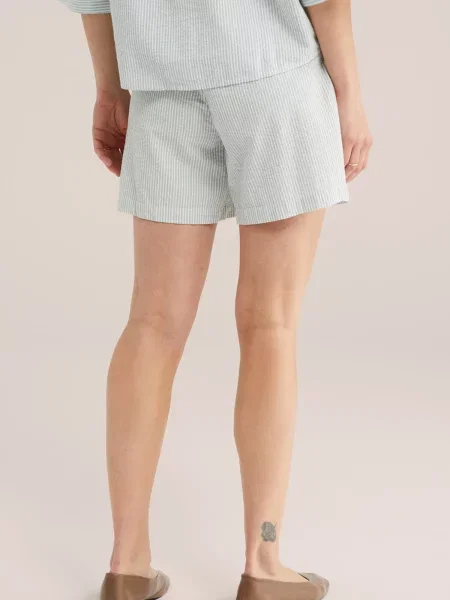 WE Fashion Élére vasalt nadrágok pasztellkék fehér