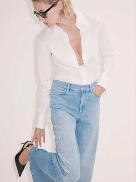Błyszczące jeansy wide leg średni Kobieta 32 MANGO niebieski