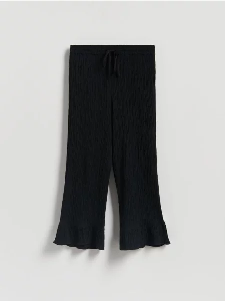 Reserved Штани з рюшами чорний