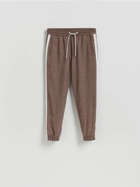 Reserved Pantaloni jogger cu lampasuri maro