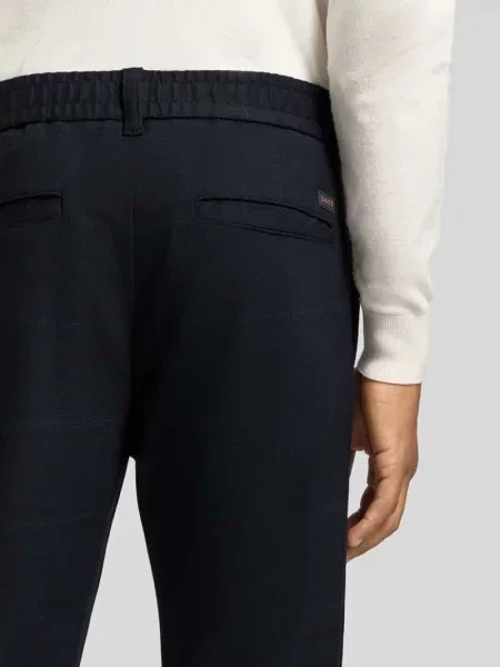 Chinosy o kroju tapered z dodatkiem Boss Orange granatowe