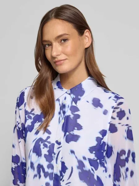 Koszula bluzkowa o kroju regular fit w półprzezroczystym designie Calvin Klein Womenswear niebieska