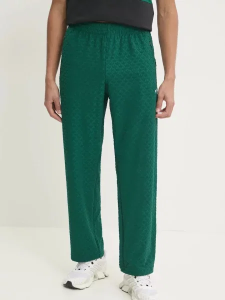 Adidas Originals spodnie dresowe MONOGRAM TR gładkie zielony