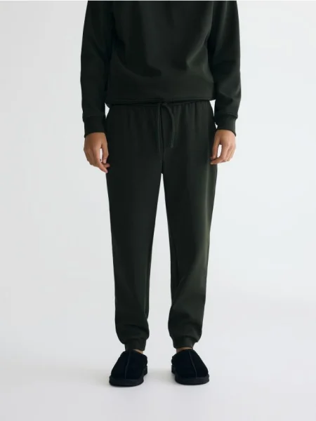 Reserved Spodnie dresowe regular fit ciemnozielony