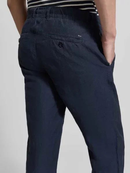 Spodnie z lnu o kroju slim fit z czystego lnu model Fabio' Brax granatowe
