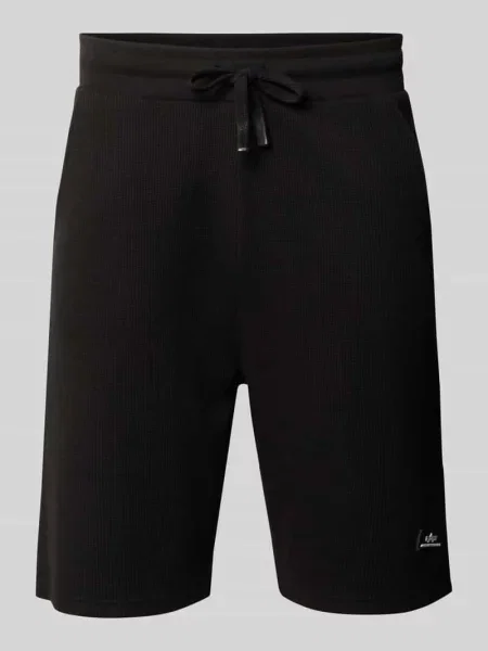 Szorty z fakturowanym wzorem i detal z logo Alpha Industries czarne