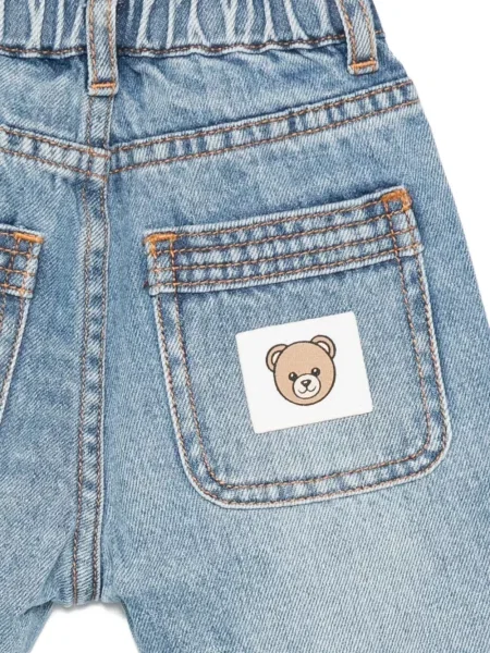 Jeansy dziecięce Moschino niebieskie