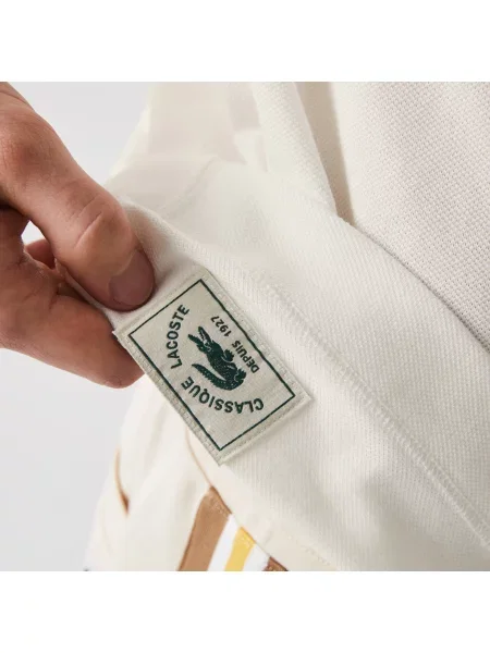 Поло Lacoste белое