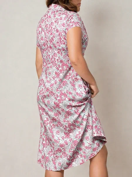 Obleka midi obleka Resti s cvetličnim vzorcem nad koleni bela