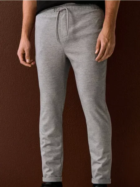 Sinsay Spodnie dresowe jogger z domieszką szary
