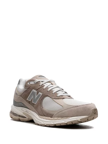 Nėriniuotos sportbačiai New Balance su raišteliais